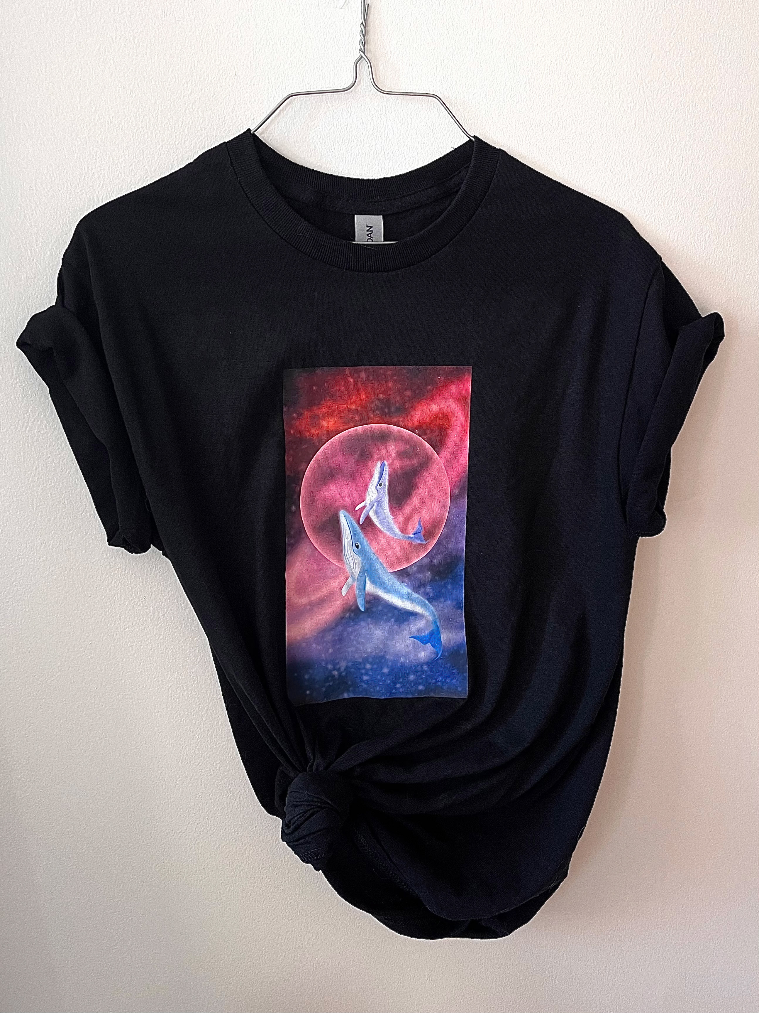 A t-shirt with the graphic printed in the middle.